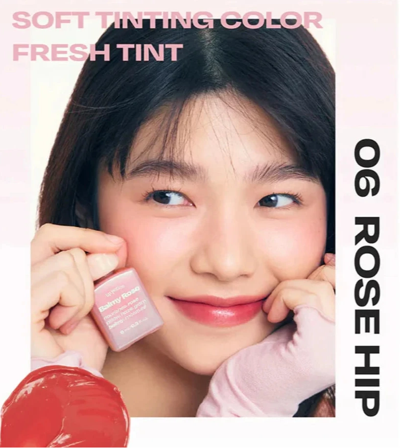 Model smiling with Alternative Stereo Balmy Rose in 06 Rose Hip – fresh tint in rich rose pink.
