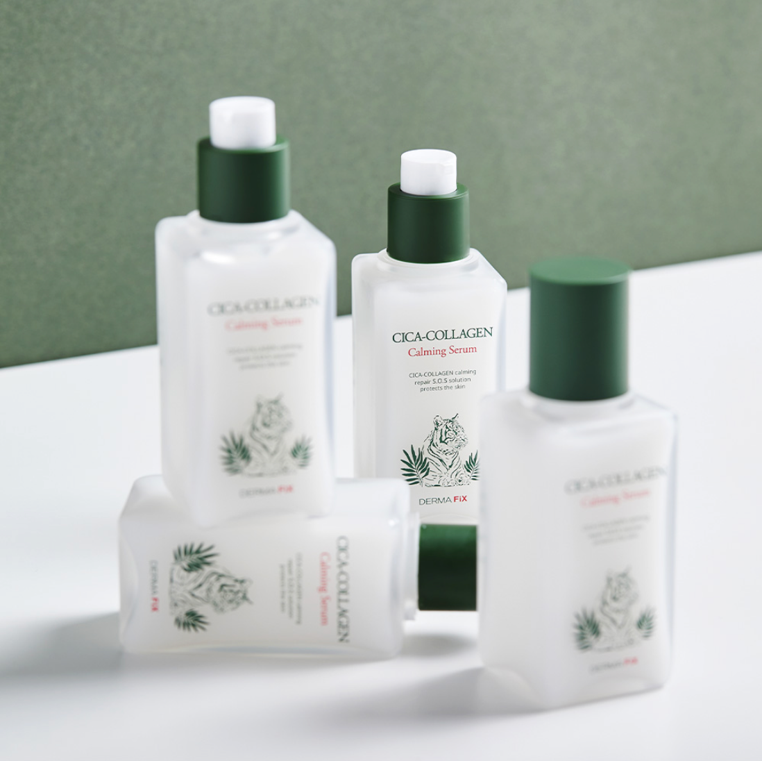 Multiple bottles of Dermafix Cica-Collagen Calming Serum arranged against a green backdrop.