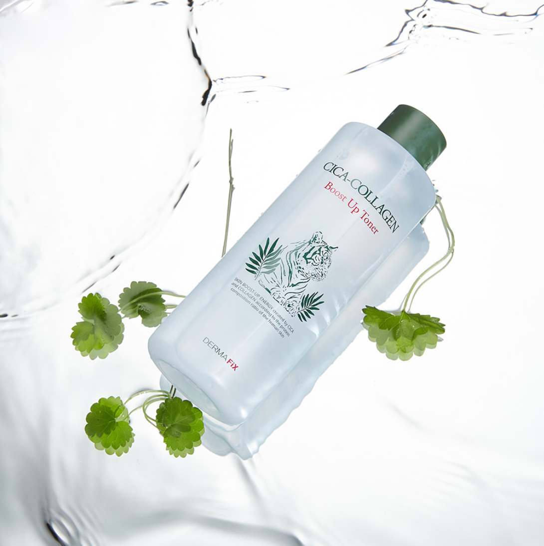 Dermafix Cica-Collagen Boost Up Toner surrounded by water and centella asiatica leaves.