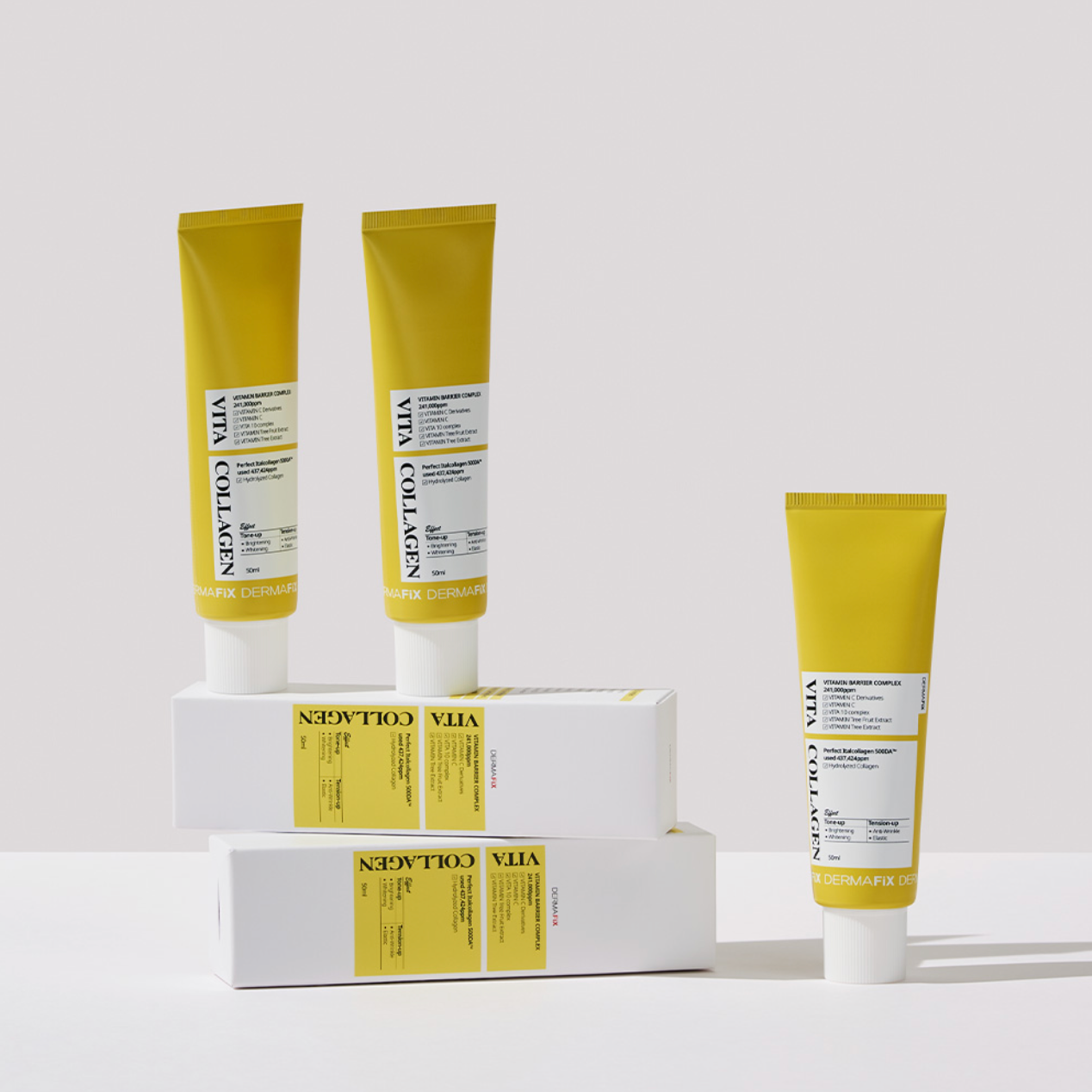 Dermafix Vita Collagen Cream tubes arranged with product boxes on a white surface.
