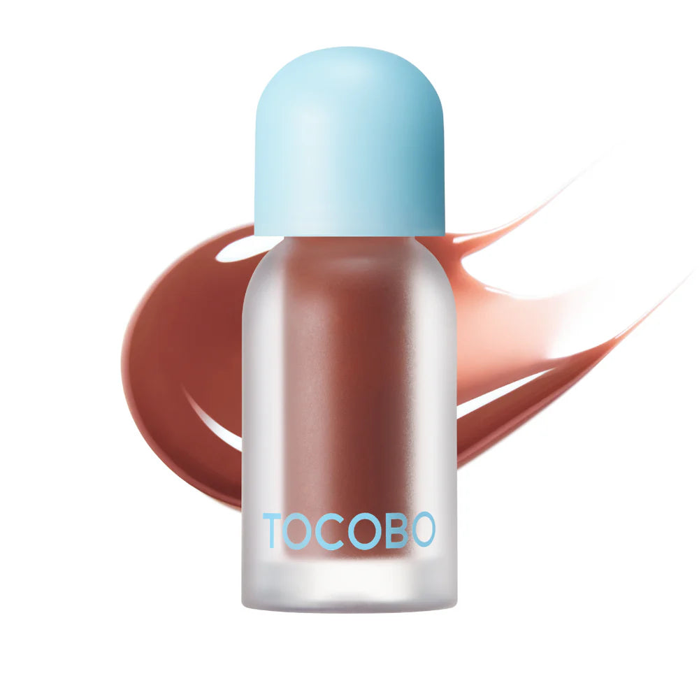 Brown TOCOBO lip oil with swatch background.