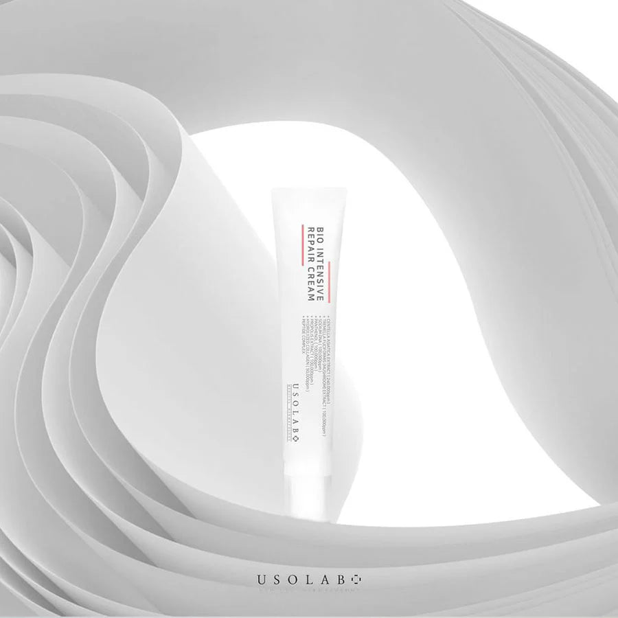USOLAB BIO Intensive Repair Cream standing in front of layered paper background.