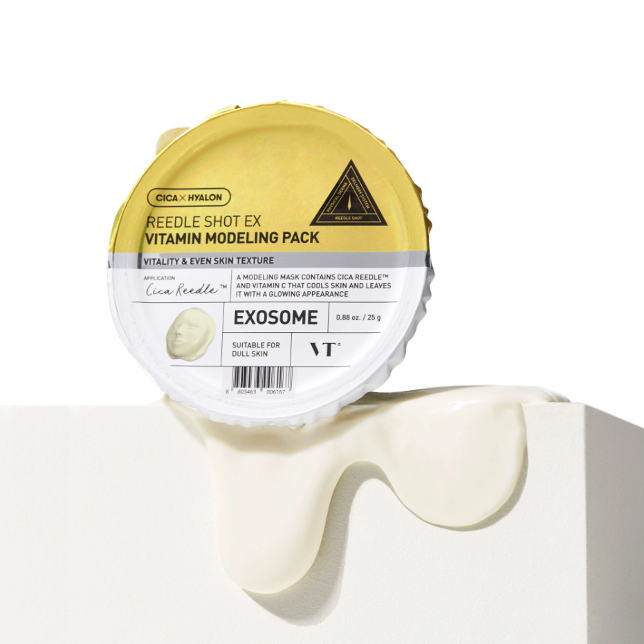 VT Reedle Shot EX Vitamin Modeling Pack with cream overflowing from the container for dull skin care.