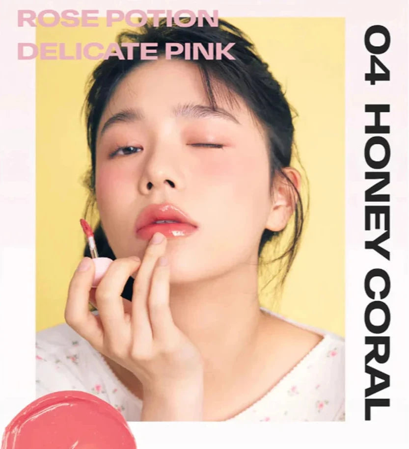 Model applying Alternative Stereo Balmy Rose in 04 Honey Coral – delicate pink glossy lip tint.