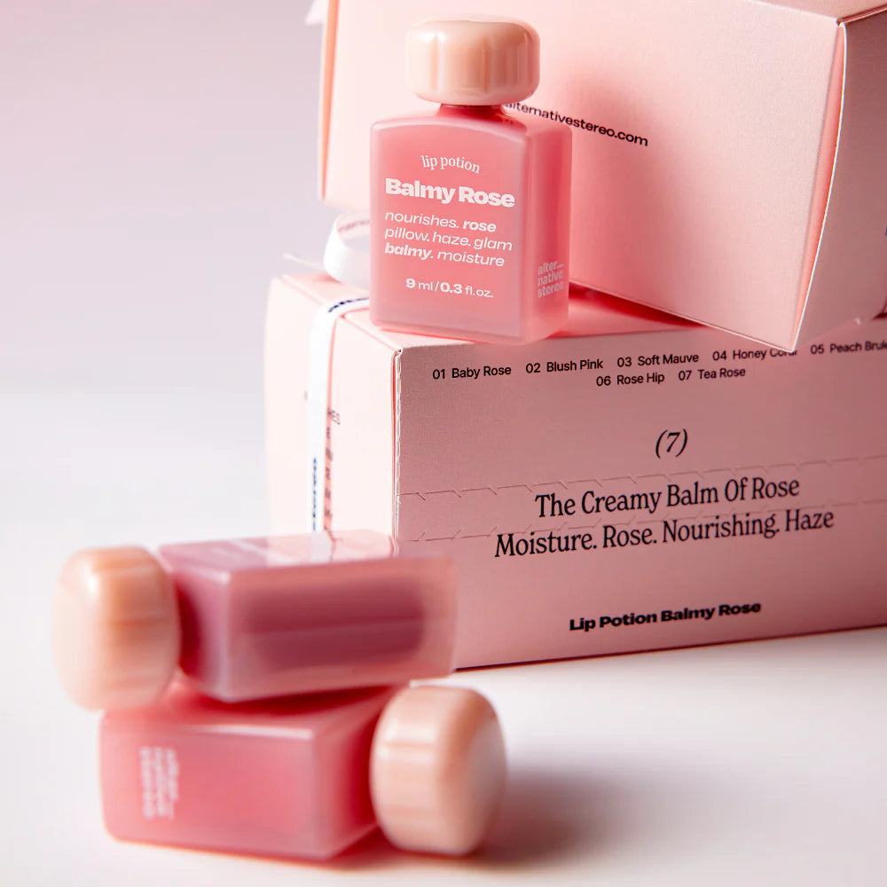 Alternative Stereo Balmy Rose shown with boxed collection – creamy rose shades for nourishing lips.