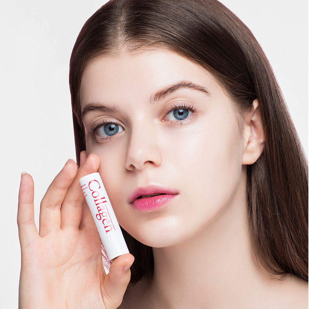 Model holding Collagen Multi Stick Balm for anti-wrinkle and hydration benefits.