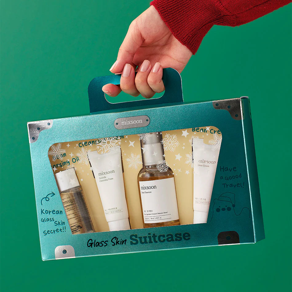 mixsoon Glass Skin Suitcase set featuring travel-size Korean skincare essentials in teal box.