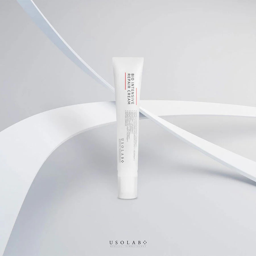 USOLAB BIO Intensive Repair Cream on light background with modern abstract white arches.